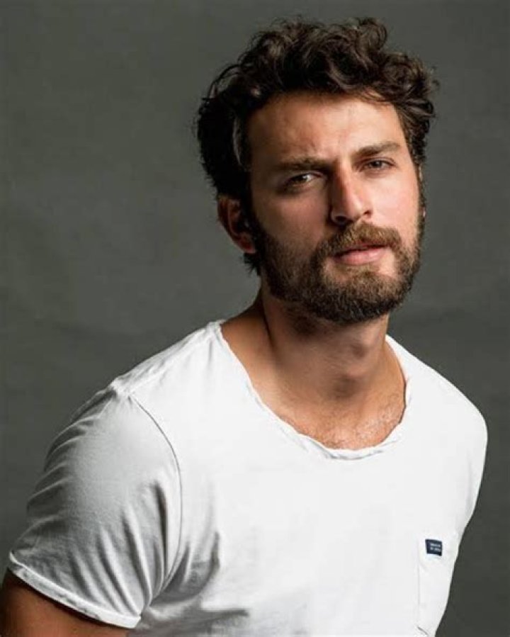 Birkan Sokullu is a Turkish Actor who has become a household name in his home country due to his performances in numerous films and television series. He began his acting career at a young age, starring in various theater productions before transitioning to television and film. He made his television debut in 2009 with a small role in the popular Turkish Drama &ldquo;K&uuml;&ccedil;&uuml;k Sırlar,&rdquo; and since then, he has become one of the most sought-after actors in Turkey. One of Birkan&rsquo;s most notable roles was as &ldquo;Murat Sarsılmaz&rdquo; in the hit series &ldquo;İ&ccedil;erde,&rdquo; Who Is Birkan Sokullu Ex- Wife Aslı Enver? Aslı Enver is a Turkish Actress and model best known for her marriage to Birkan Sokullu, a popular Turkish Actor. The couple was married for several years before announcing their divorce in 2020. Aslı Enver and Birkan Sokullu were married in 2014 after dating for several years. They were considered among the most iconic couples in the Turkish entertainment industry, and fans celebrated their marriage widely. However, in 2020, the couple announced that they were divorcing. The reason for their divorce has not been publicly disclosed. Aslı Enver was born in Istanbul, Turkey, on October 14, 1987. She began her acting career in 2007 with a small role in the Turkish Drama &ldquo;Son Bahar,&rdquo; and since then, she has appeared in numerous television series and films.&nbsp; In addition to her acting career, Aslı Enver is also known for her modeling work. She has worked with various brands and featured in numerous fashion campaigns. Despite their divorce, Aslı Enver and Birkan Sokullu have remained amicable and have continued to work together on various projects. Aslı Enver remains a well-respected and successful Actress in the Turkish entertainment industry. Who Is Birkan Sokullu Dating ? Does He Have Kids?&nbsp; Sokullu is presently involved with his girlfriend, Burcu Biricik. Biricik, on the other hand, is an Actress who co-starred with Sokullu in the film Hayat Sarkisi. The pair appears to have met during filming. The couple also blessed them with one daughter. Aside from that, there is no word on whether the couple is married, but they have been in a relationship for quite some time. Birkan began dating Berrak Tuzunatac after divorce from his former marriage. Unfortunately, their romance ended. The duo hasn&rsquo;t been seen together since. Sokullu was also in a relationship with Dilan Cicek Deniz. However, their romance did not survive as long as they had hoped.&nbsp; The pair briefly dated for three months before breaking up for unknown reasons. They also never revealed the cause of their breakup. What Is Birkan Sokullu Family Ethnicity ? Birkan Sokullu was born in Istanbul, Turkey, on October 6, 1985. Furthermore, his grandparents are Bosnian immigrants. Therefore he is of mixed race and retains Turkish nationality. He attended a nearby high school where he played basketball early on. Furthermore, he holds a degree in Radio Tv Programming from Maltepe University. Birkan began his modeling career while attending University. Later, he entered Dolunay Soysert, where he studied acting. In 2008, he made his feature film debut as Levent in Melekler Korusun. In the same year, he participated in another film, Kucuk Kadinlar, playing the character of Ayaz. In addition, he portrayed Mustafa in the film Elif, which was his biggest break. After that, he took a break from acting before returning in 2010 to play Demir in the film Kucuk Sircar. What Is Birkan Sokullu Net Worth 2023? Birkan has a modeling career and has also played basketball in the past.&nbsp;Thus, all of Birkan&rsquo;s income and profits are calculated and evaluated; he may have a&nbsp;net worth&nbsp;of $1.5 million. Apart from that, he is still active in his job, which suggests that his net worth may increase in the future. Birkan has also appeared in several films, including &ldquo;K&ouml;pr&uuml;dekiler,&rdquo; &ldquo;Yol Arkadaşım,&rdquo; and &ldquo;Sen Anlat Karadeniz.&rdquo; His performances in these films have further solidified his reputation as a talented and versatile Actor. Birkan Sokullu